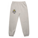Unisex relax faded track pants in faded bone with crown embroidery – front view